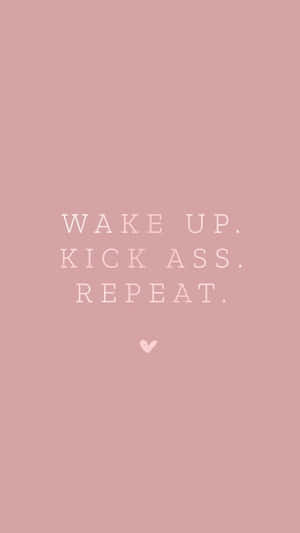 粉紅色背景，白色文字寫著 wake up kick ass repeat 和一個小心形。 — 9:16 壁紙