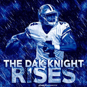 雨中持球的橄欖球運動員，附有文字 The Dak Knight Rises — 荼毘 GIF 壁紙