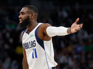 職業籃球運動員在比賽中身穿達拉斯球衣做手勢。 — 科比· Bryant 壁紙