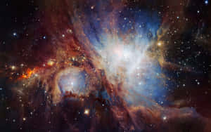 一個色彩繽紛的星雲，在深空中有發光的雲層和明亮的星星。 — 太空 壁紙