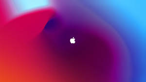 彩色抽象漸變背景上的白色Apple標誌 — 漸變動畫 壁紙