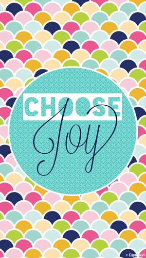 色彩繽紛的扇形圖案，帶有包含「Choose Joy」文字的青綠色圓圈。 — iPhone 6 壁紙