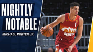 Michael Porter Jr. 身穿丹佛金塊球衣在夜間比賽中運球。