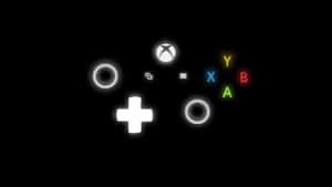 在黑暗中漂浮的發光Xbox控制器按鈕 — Xbox GIF 壁紙
