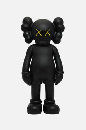 帶有黃色X眼睛的黑色KAWS Companion公仔靜止站立。