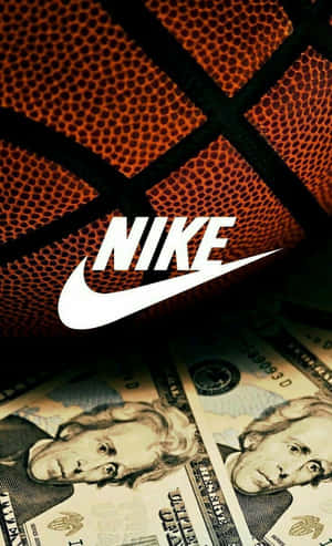 Nike標誌在籃球和美元鈔票上 — 錢 壁紙