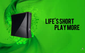 黑色Xbox 360主機，綠色漩渦和文字life's short play more — Xbox GIF 壁紙