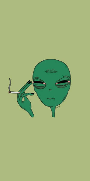 綠色外星人帶著疲倦的眼睛，手持點燃的香煙。 — 異鄉人 GIF 壁紙