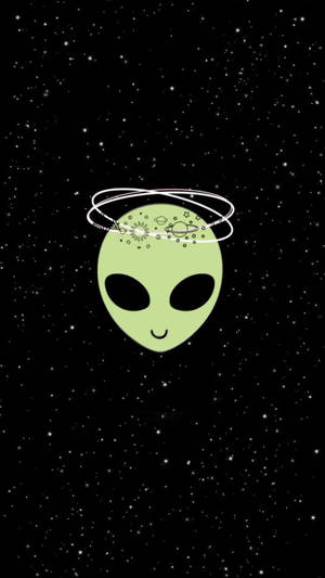 一個微笑的綠色外星人，帶著繞行的行星，在星光閃爍的太空背景前。