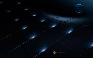 深藍色金屬瓷磚，帶有發光高光和Windows 7標誌。
