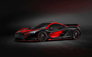 黑色McLaren P1跑車在黑暗的工作室環境中帶有紅色亮點。
