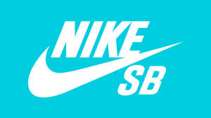 白色Nike SB標誌在青綠色背景上