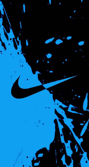 黑色背景上帶有藍色油漆飛濺的Nike標誌