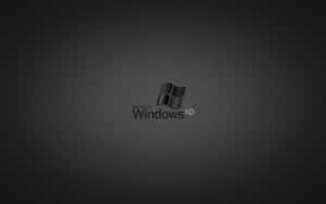 Microsoft Windows XP標誌在深灰色漸變背景上