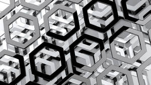帶有黑色輪廓和灰階陰影的抽象3D六邊形圖案。