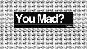 Trollface 迷因圖案，黑色橫條上有粗體白色字母「You Mad?」。 — Meme 表情 壁紙