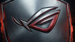 拉絲金屬盾牌上帶有紅色照明的 ROG 遊戲標誌。