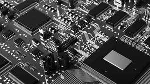 黑白電路板的特寫，帶有銀色路徑和元件。