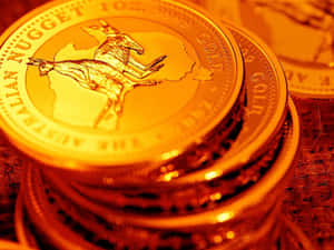 一堆澳洲金幣，袋鼠圖案溫暖發光。 — 錢 壁紙