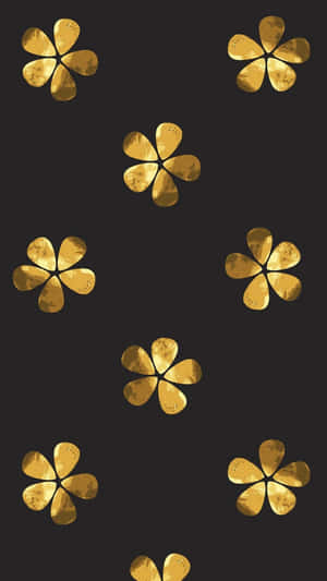 金色紋理花朵散落在黑色背景上。 — 金色美學 GIF 壁紙