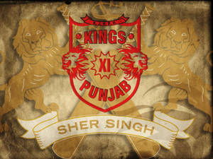 Kings XI Punjab 球隊紋章，獅子和 Sher Singh 橫幅位於紋理背景上。