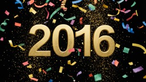 金色2016文字，彩色紙屑在黑色背景上飄落