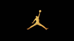 金色籃球運動員剪影在半空中灌籃對比黑色背景 — Air Jordan GIF 壁紙