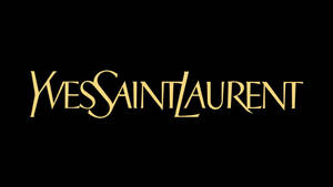 黑色背景上的金色 Yves Saint Laurent 標誌