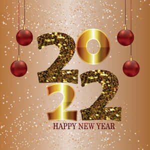 金色2022文字，帶有紅色裝飾和五彩紙屑，用於新年慶祝。 — iPad Air 壁紙
