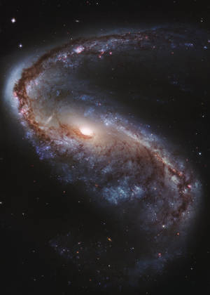 螺旋星系，在深空中帶有發光的旋臂和散落的星星。