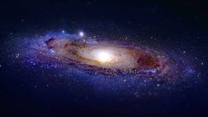 深空中帶有發光核心和旋轉旋臂的螺旋星系。