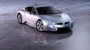 反光混凝土表面上的銀色BMW i8跑車。