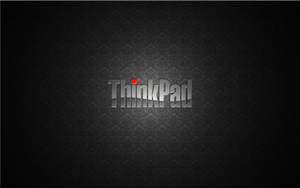 ThinkPad 標誌，紅色圓點，位於深色紋理背景上。