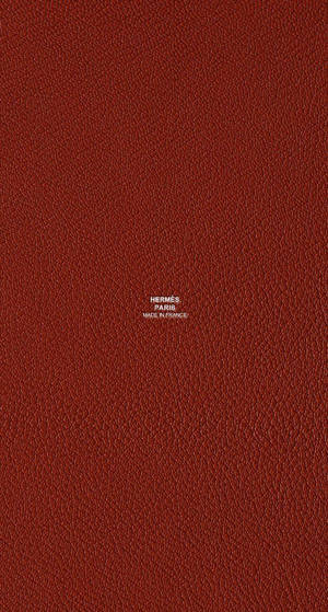 勃艮第色皮革，中央有Hermès Paris Made in France文字。