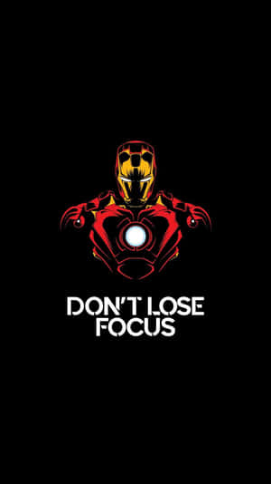 鐵甲奇俠帶有發光的弧形反應爐，黑色背景上寫有「Don't Lose Focus」文字。 — 鋼鐵人 壁紙