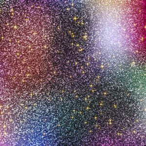 帶有金色星星的閃爍彩虹漸變背景 — iPad (A16) 壁紙