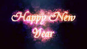 Happy New Year 文字在黑暗背景上發光並帶有閃爍