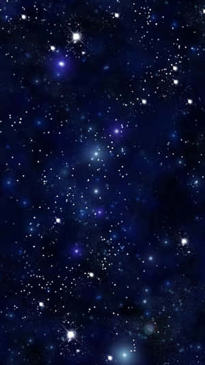 廣闊的星場，在深藍色太空中帶有發光的星雲。 — 閃粉 壁紙