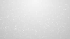 雪花在明亮的冬季場景中輕輕飄落。