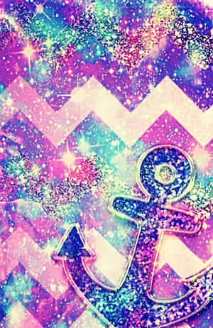 在彩色人字形圖案上，一個發光的錨被閃粉和星星包圍。 — 閃粉 壁紙