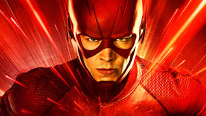 身穿紅色戰衣的超級英雄 The Flash，身後帶有閃電效果。
