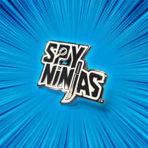 藍色漫畫風格放射狀背景上的閃亮Spy Ninjas徽章
