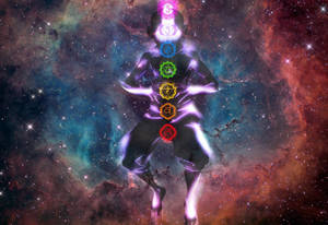 在星空宇宙背景下，帶有發光脈輪的人形剪影。