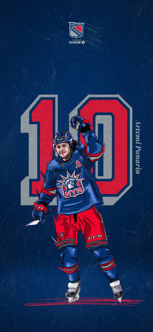 冰球運動員 Artemi Panarin 身穿遊騎兵隊裝備，舉起球棒慶祝。 — Galaxy Note 壁紙