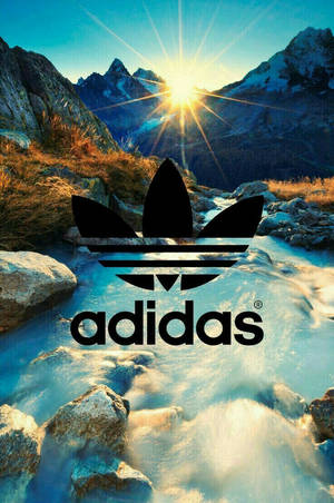日落時分山間溪流上的Adidas標誌
