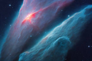 一個色彩繽紛的星雲，有紅色和藍色的雲以及散佈在深空的星星。