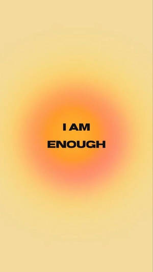 在溫暖的漸變背景上的勵志文字「I AM ENOUGH」。