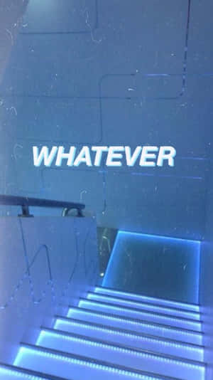 現代工業風格中，藍色燈光樓梯，牆上帶有「WHATEVER」文字。