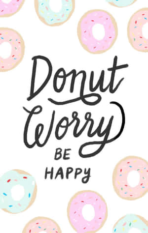 Donut Worry BE HAPPY 勵志語句，周圍環繞著色彩繽紛的糖針冬甩。