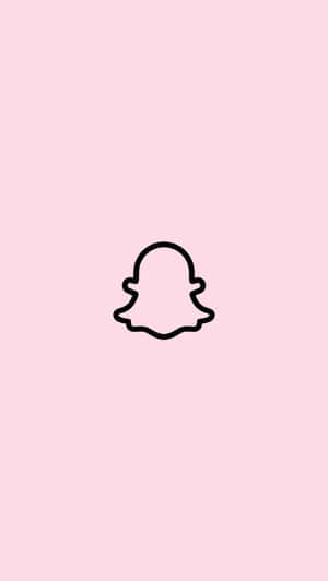 粉紅色背景上的 Snapchat 鬼魂標誌